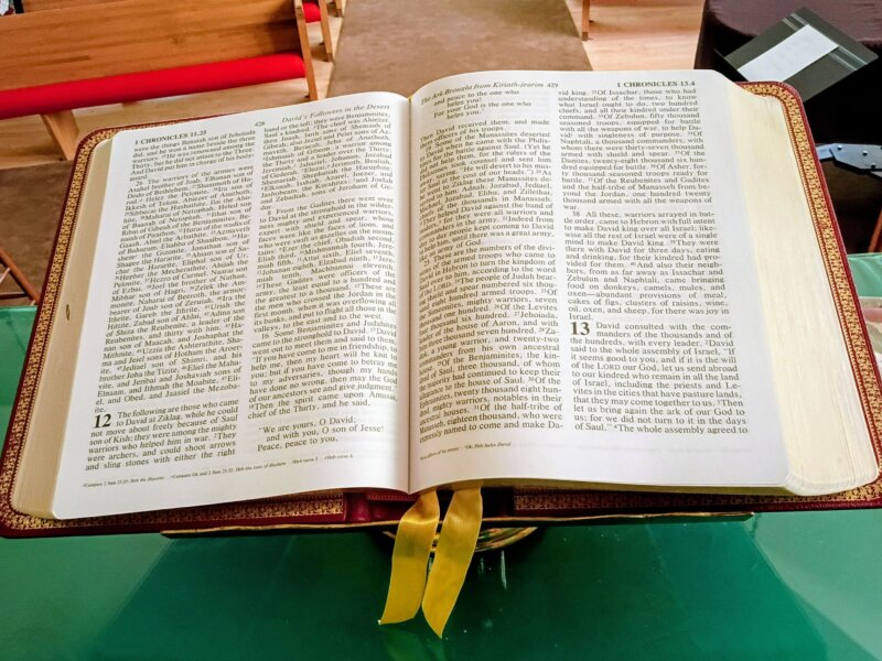 Christian Bible opened on top of altar